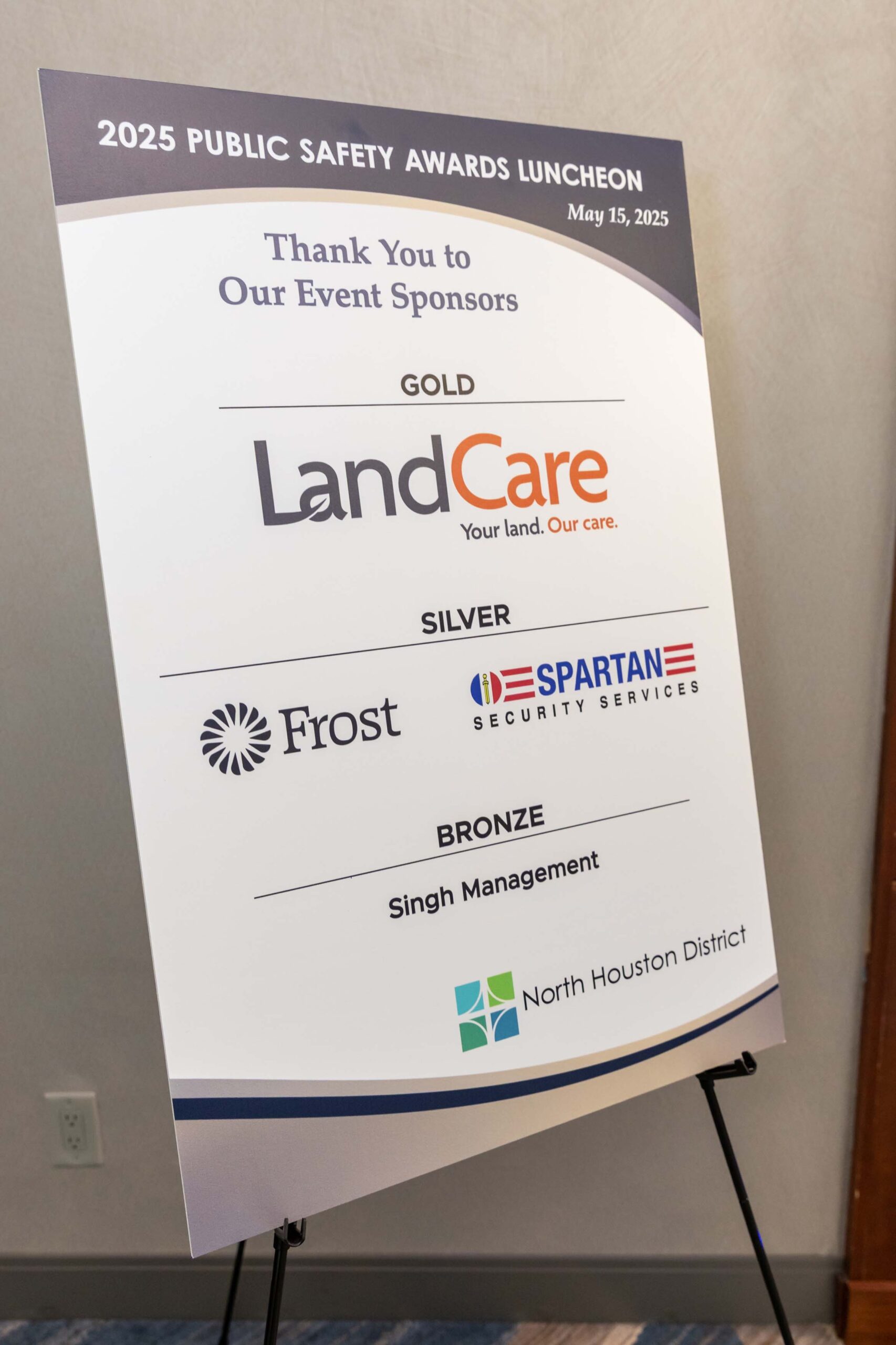 Event signage thanks Public Safety Awards sponsors, including LandCare, Frost, and Spartan.